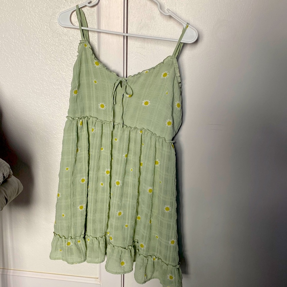Light green eyelet dress with yellow sunflowers. Lightly worn. From Forever 21.